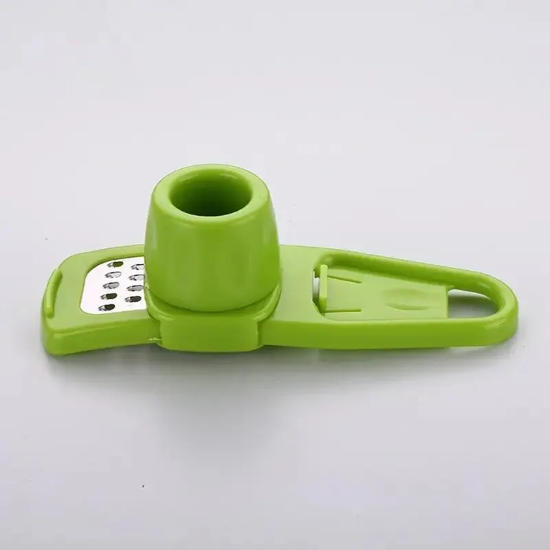 مفرمة ثوم صغيرة يدوية مبتكرة ل - مراجعة Kitchen Gadgets Garlic وسعره