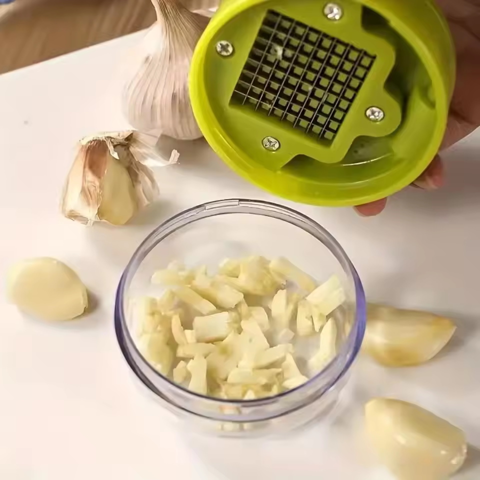 مفرمة ثوم يدوية مع صندوق تخزين - مراجعة Kitchen Gadgets Garlic وسعره