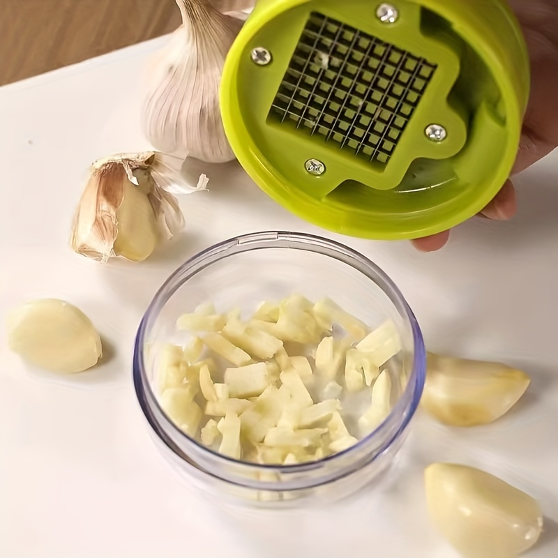 قطاعة ثوم يدوية متعددة الوظائف - مراجعة Kitchen Gadgets Garlic وسعره