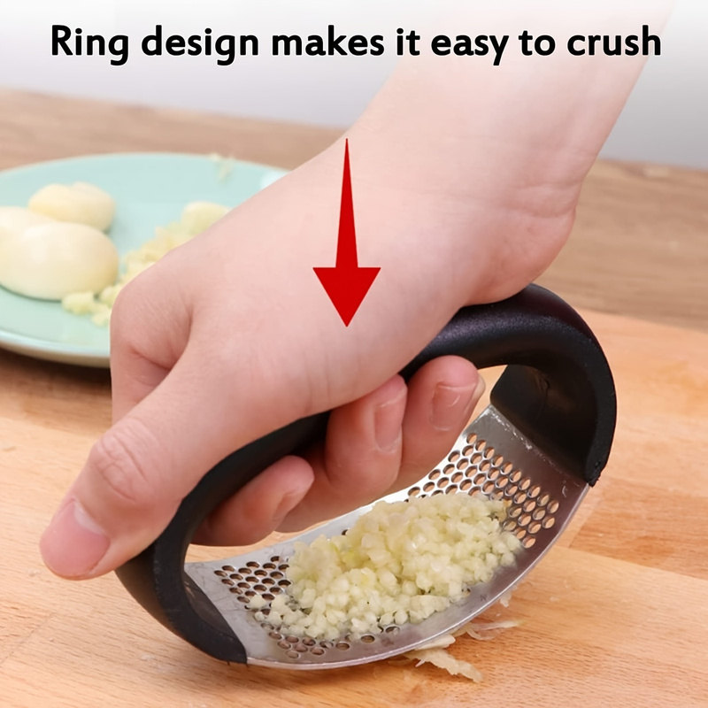 مفرمة ثوم يدوية من الفولاذ الم - مراجعة Kitchen Gadgets Garlic وسعره